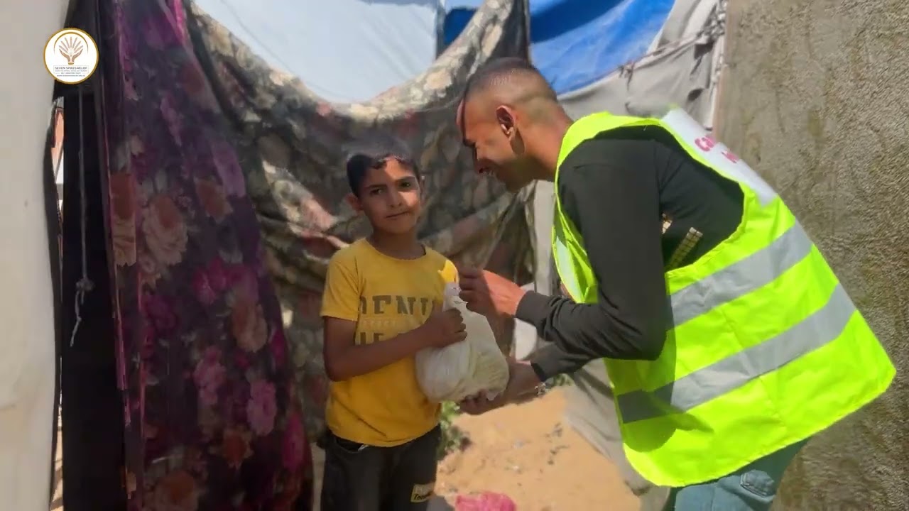 Bread Distribution (35) to the Displaced Families in Gaza, Thanks to Camberly Car Wash